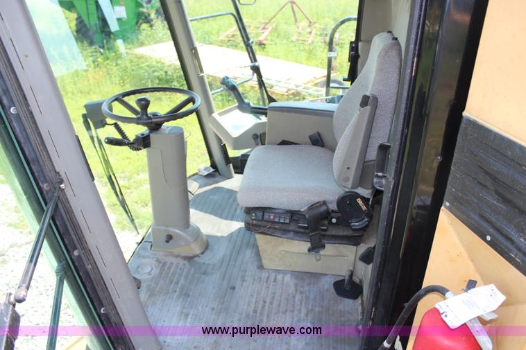 image for item H6539 1998 Caterpillar Lexion 460 RWA combine