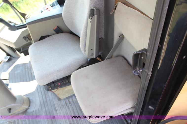 image for item H6539 1998 Caterpillar Lexion 460 RWA combine