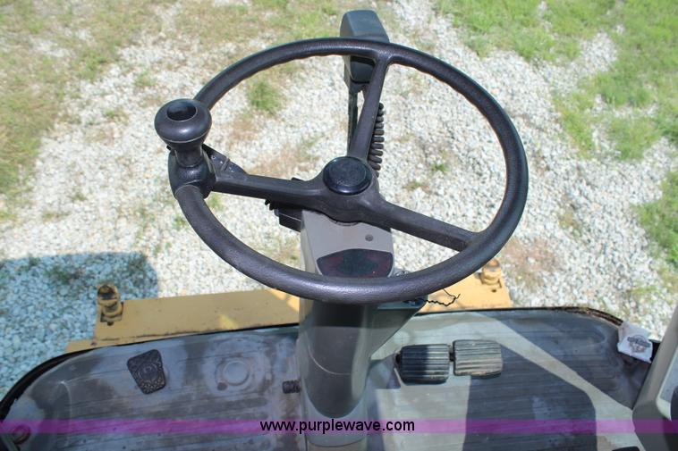 image for item H6539 1998 Caterpillar Lexion 460 RWA combine