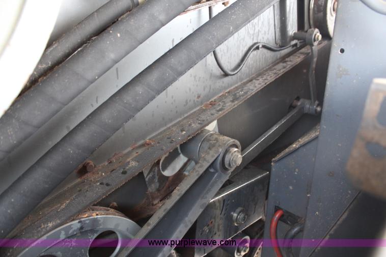 image for item H6539 1998 Caterpillar Lexion 460 RWA combine