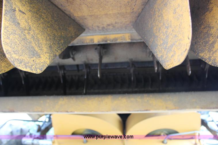 image for item H6539 1998 Caterpillar Lexion 460 RWA combine