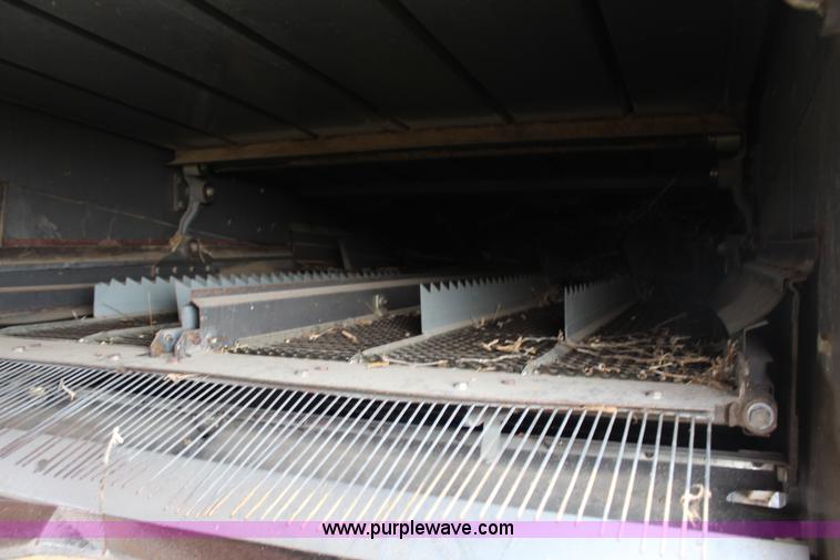 image for item H6539 1998 Caterpillar Lexion 460 RWA combine