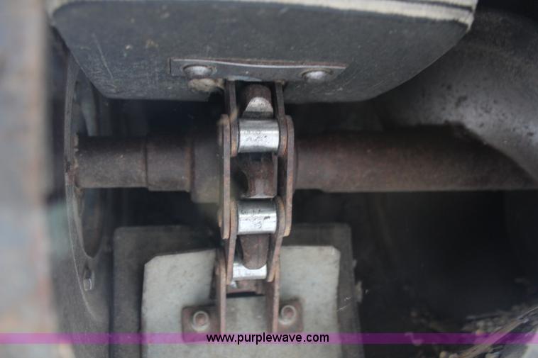 image for item H6539 1998 Caterpillar Lexion 460 RWA combine