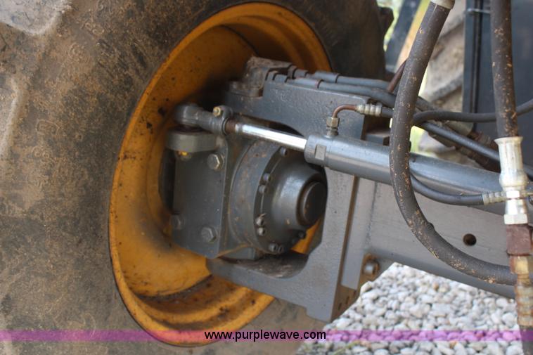 image for item H6539 1998 Caterpillar Lexion 460 RWA combine