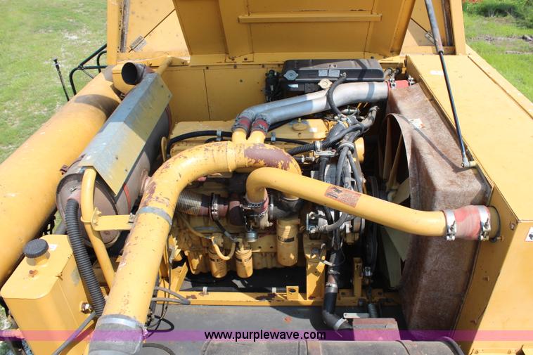 image for item H6539 1998 Caterpillar Lexion 460 RWA combine