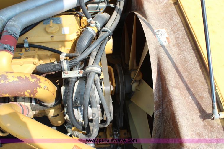 image for item H6539 1998 Caterpillar Lexion 460 RWA combine