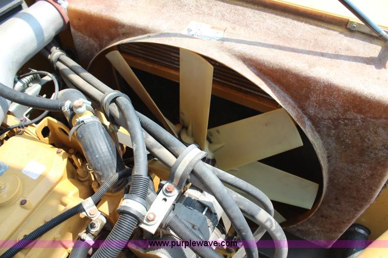 image for item H6539 1998 Caterpillar Lexion 460 RWA combine