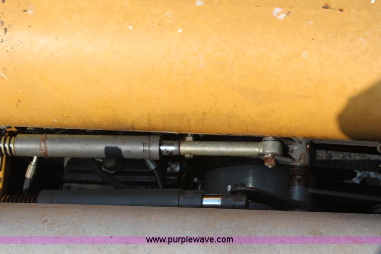 image for item H6539 1998 Caterpillar Lexion 460 RWA combine