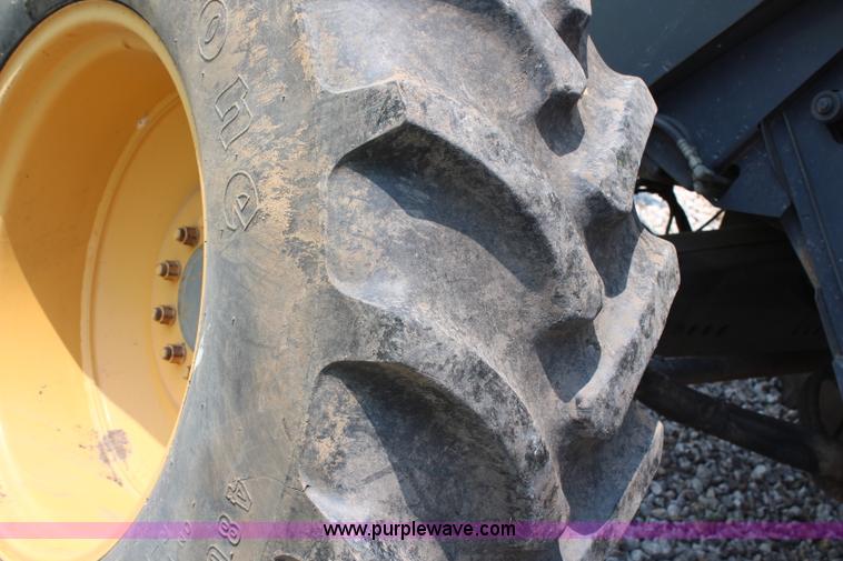 image for item H6539 1998 Caterpillar Lexion 460 RWA combine