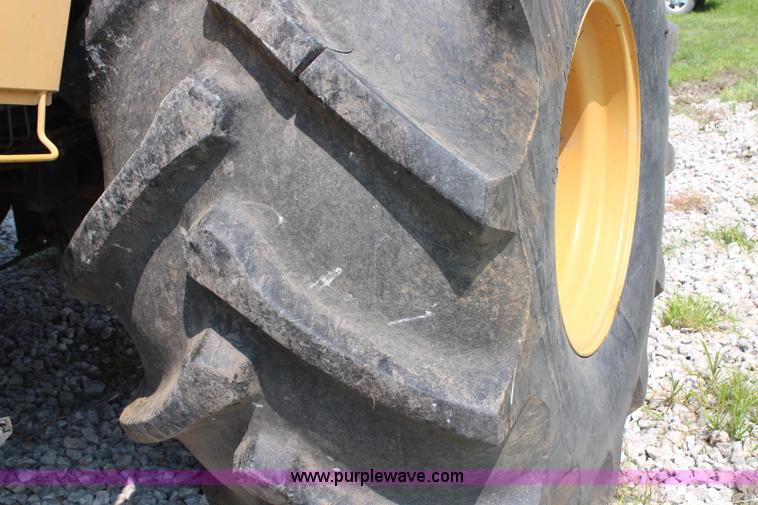 image for item H6539 1998 Caterpillar Lexion 460 RWA combine