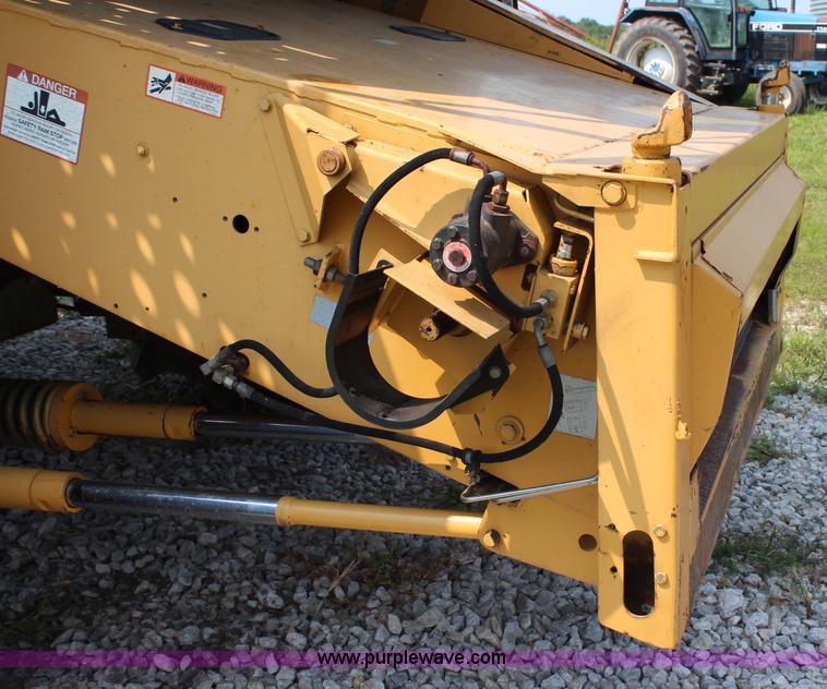 image for item H6539 1998 Caterpillar Lexion 460 RWA combine