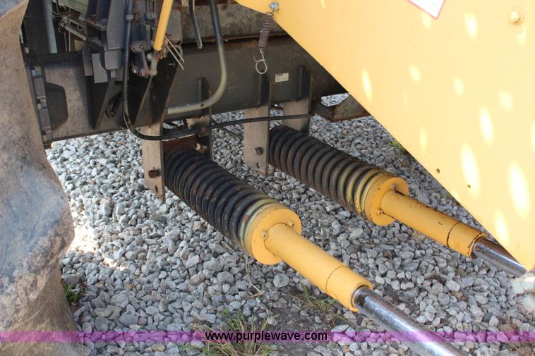 image for item H6539 1998 Caterpillar Lexion 460 RWA combine