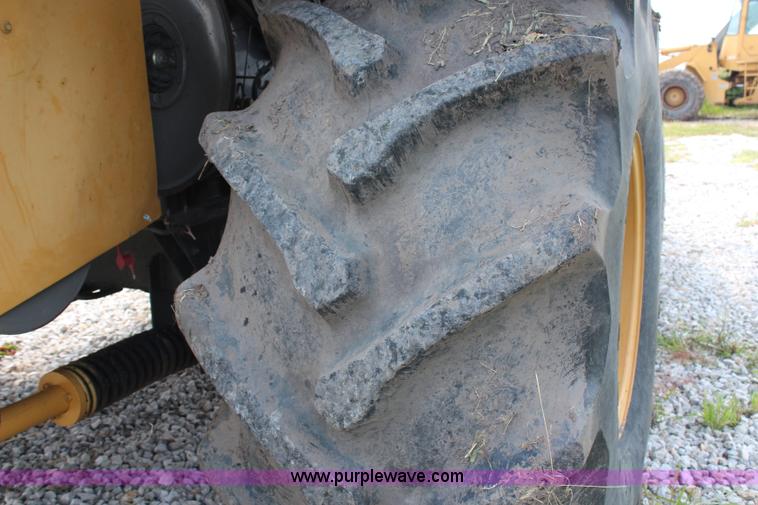 image for item H6539 1998 Caterpillar Lexion 460 RWA combine