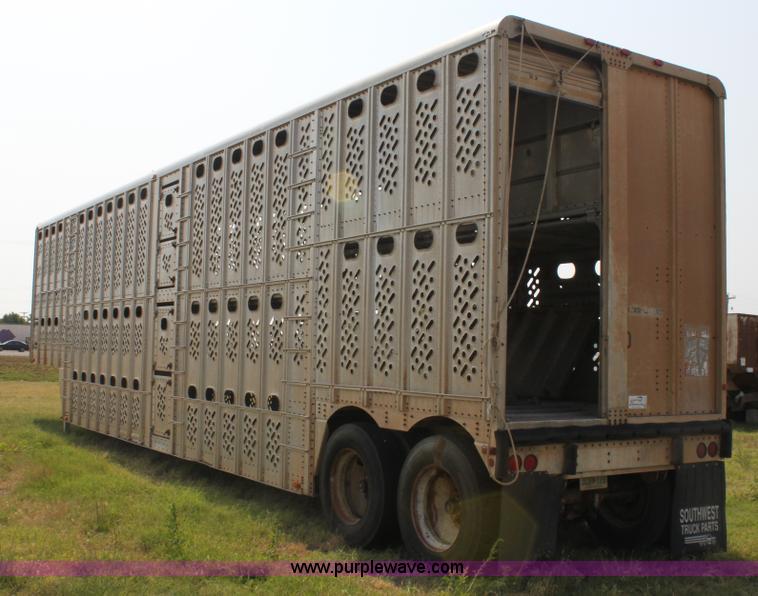 image for item H7417 1985 Wilson 53' aluminum cattle pot trailer