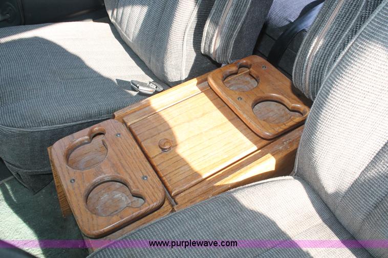 image for item I7948 1990 Ford F700 flatbed hauler truck