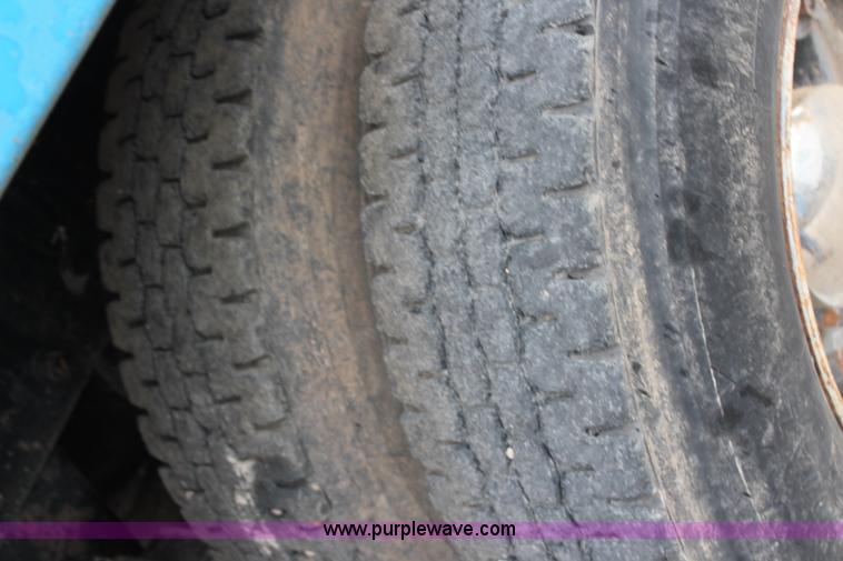 image for item H6509 1992 Mack RD688S quad axle dump truck