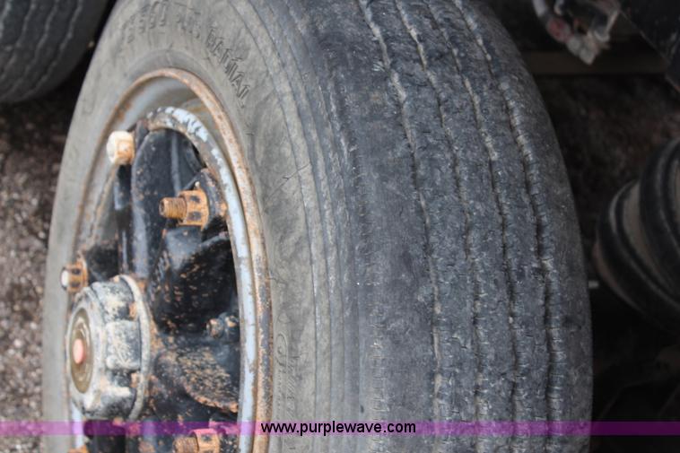 image for item H6510 1994 Mack RS688S quad axle dump truck