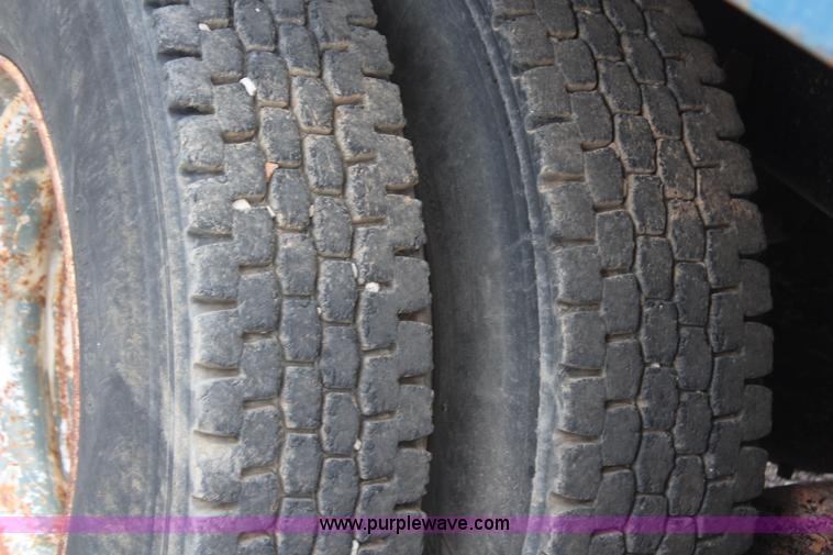 image for item H6510 1994 Mack RS688S quad axle dump truck