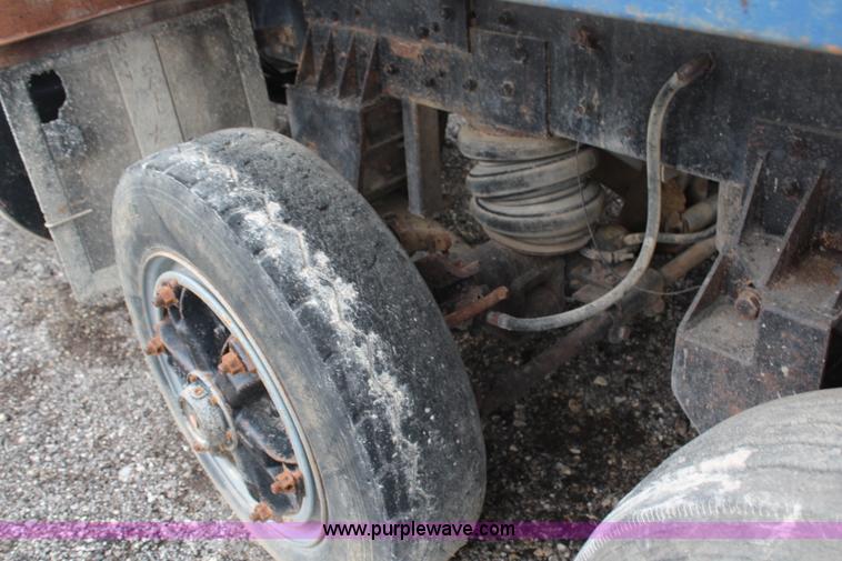 image for item H6512 1994 Mack RS688S quad axle dump truck