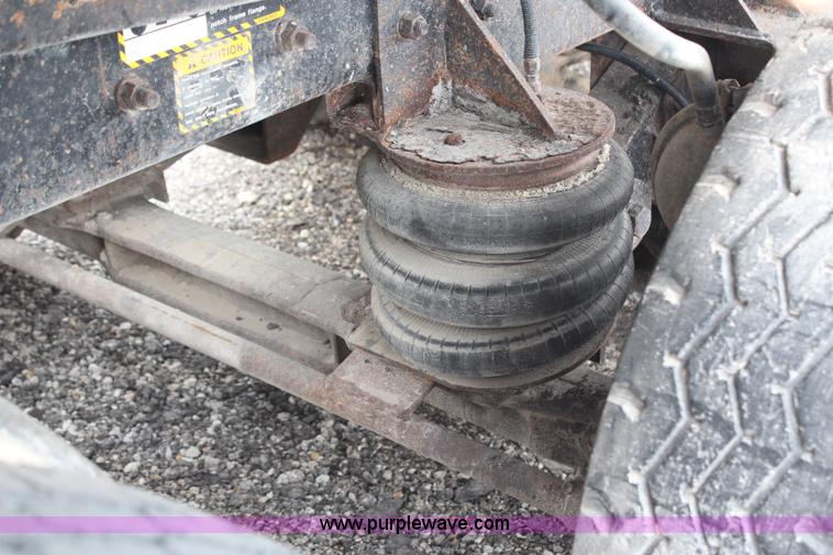 image for item H6512 1994 Mack RS688S quad axle dump truck