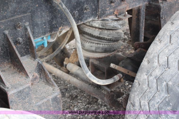 image for item H6512 1994 Mack RS688S quad axle dump truck