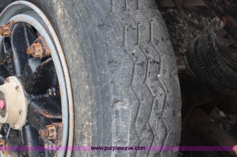 image for item H6512 1994 Mack RS688S quad axle dump truck