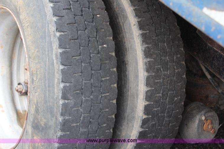 image for item H6512 1994 Mack RS688S quad axle dump truck