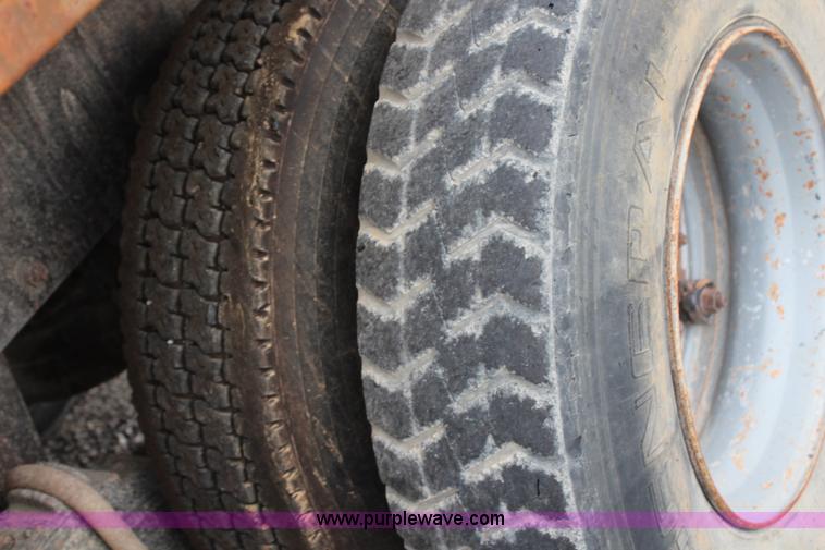 image for item H6512 1994 Mack RS688S quad axle dump truck