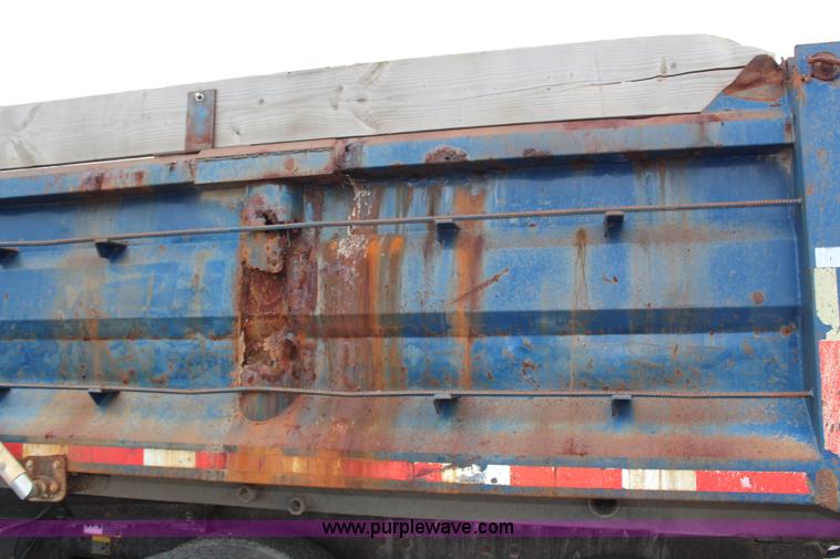 image for item H6512 1994 Mack RS688S quad axle dump truck