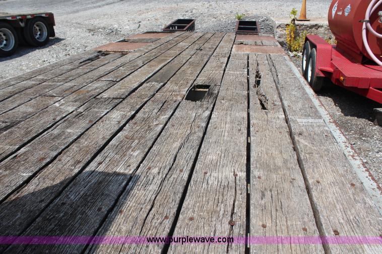 image for item H6718 1999 Trail King double axle gooseneck trailer