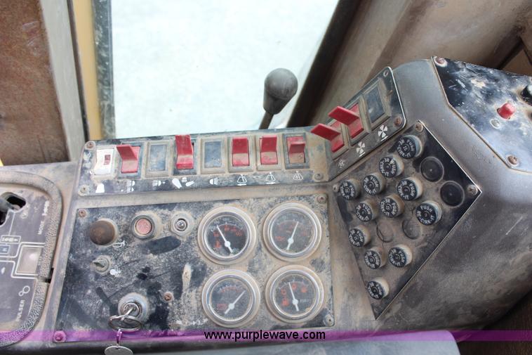 image for item H6720 1989 Champion 720A articulated motor grader