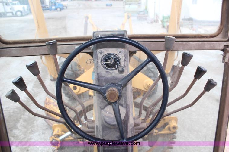 image for item H6720 1989 Champion 720A articulated motor grader