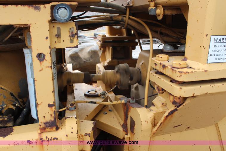 image for item H6720 1989 Champion 720A articulated motor grader