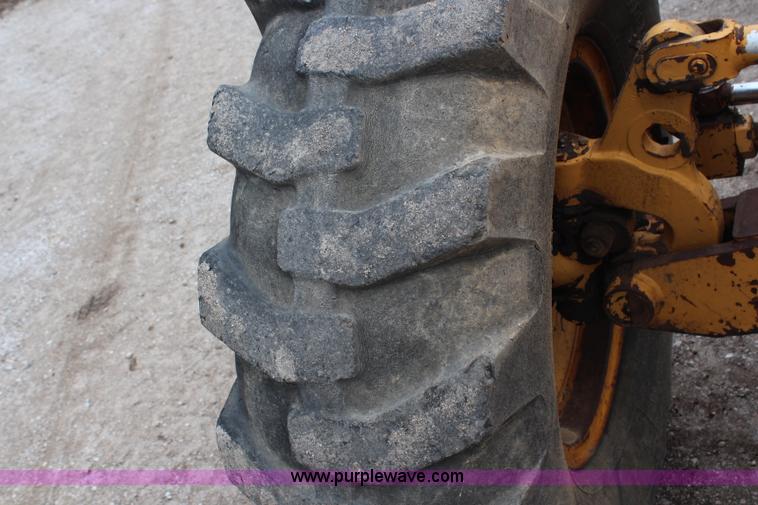 image for item H6720 1989 Champion 720A articulated motor grader