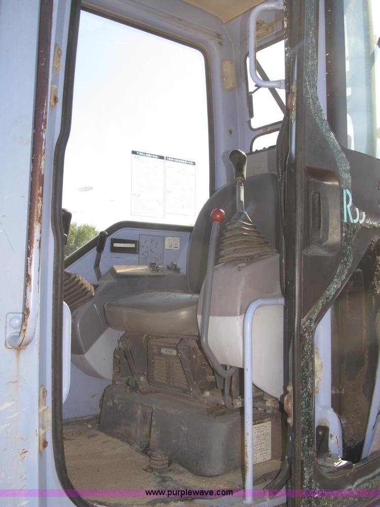 image for item F7104 Komatsu PC75UU-3 excavator