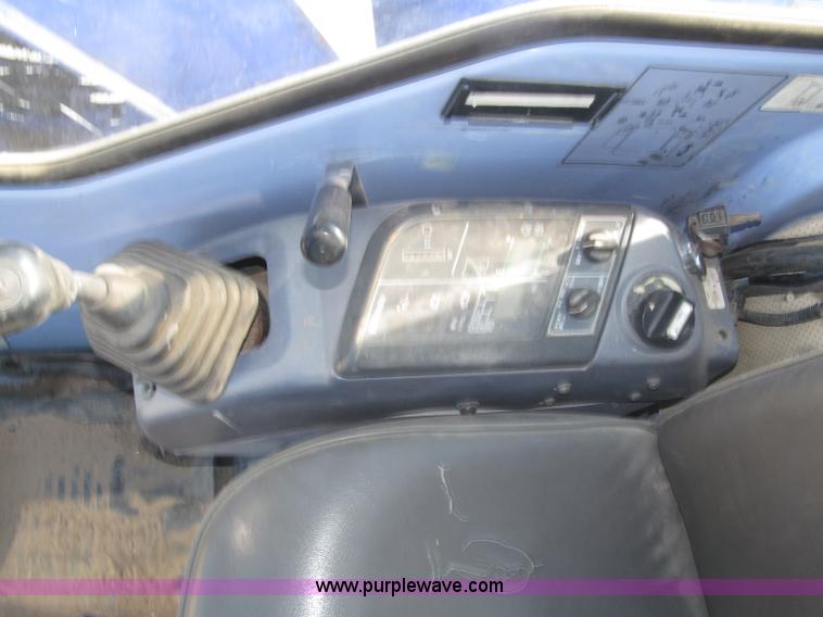 image for item F7104 Komatsu PC75UU-3 excavator