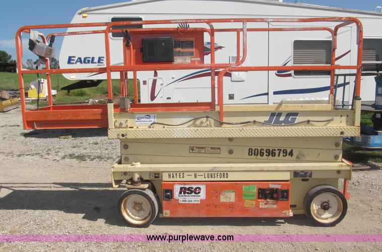 image for item F7105 1997 JLG 2033E scissor lift