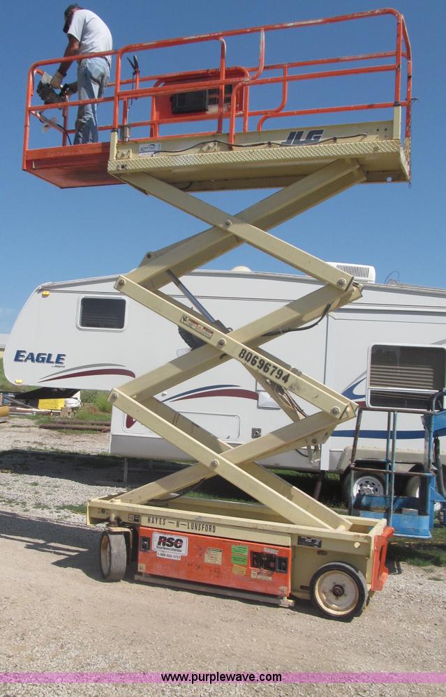 image for item F7105 1997 JLG 2033E scissor lift