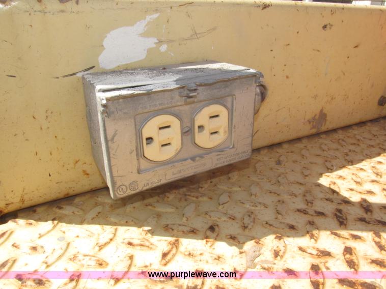 image for item F7105 1997 JLG 2033E scissor lift