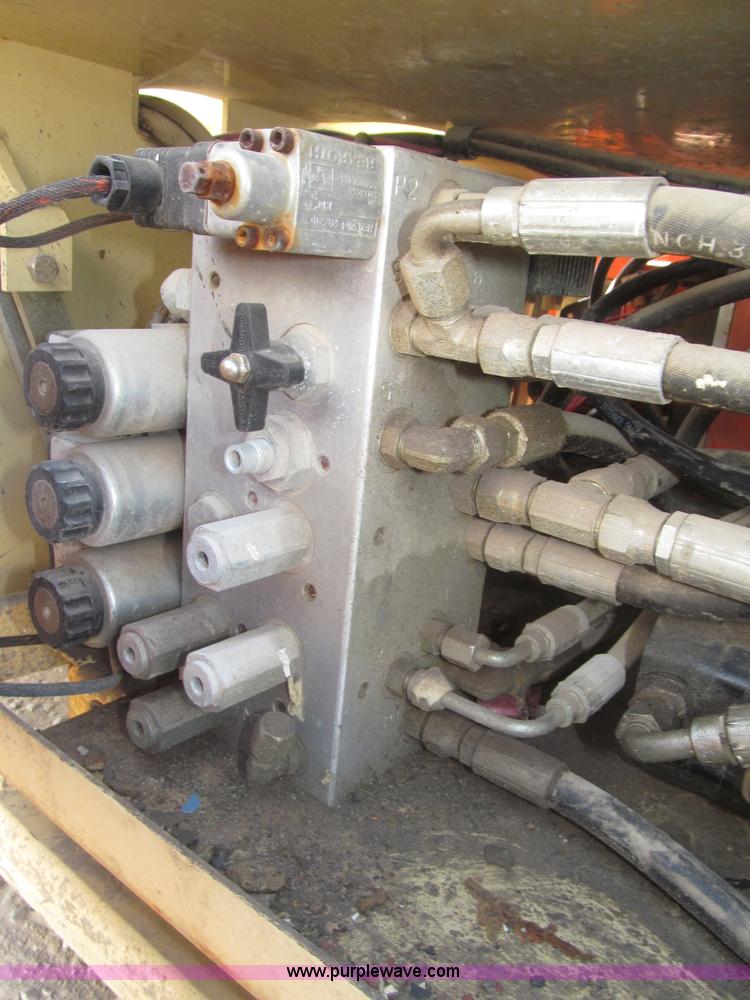 image for item F7105 1997 JLG 2033E scissor lift