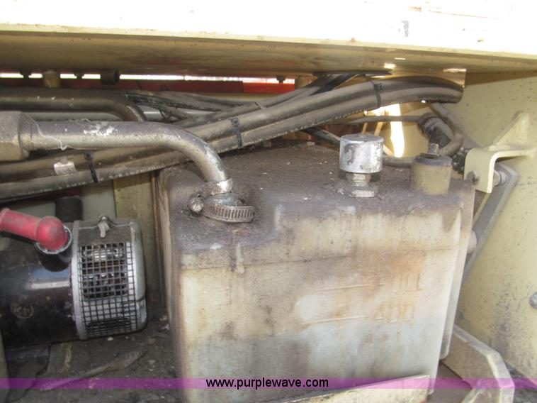 image for item F7105 1997 JLG 2033E scissor lift