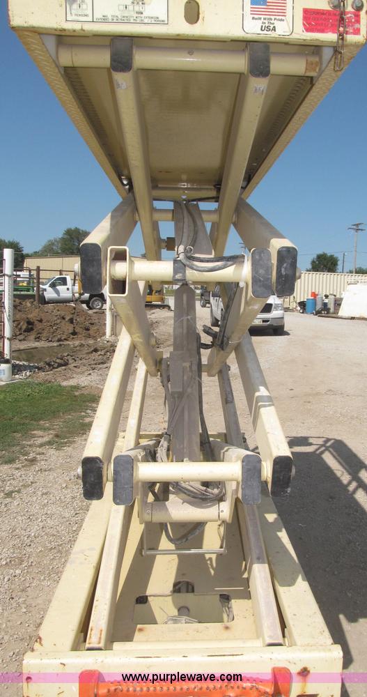 image for item F7105 1997 JLG 2033E scissor lift