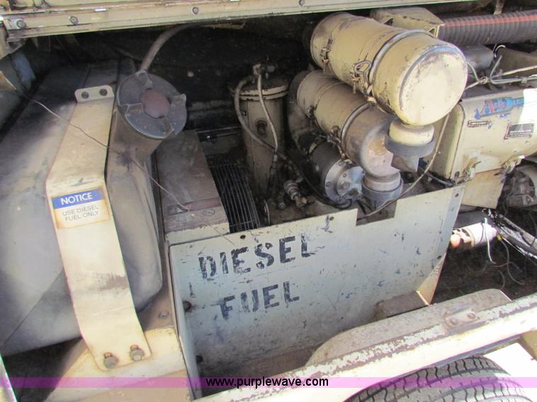 image for item G4083 Ingersoll Rand 100 portable air compressor