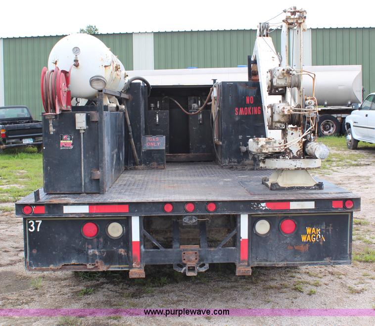 image for item H6515 1990 Ford F450 Super Duty flatbed truck