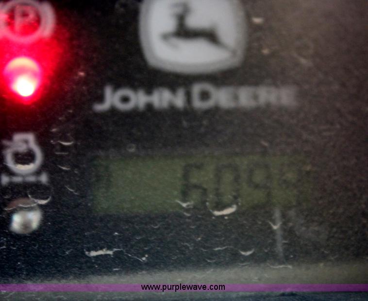 image for item H6519 1999 John Deere 250 skid steer