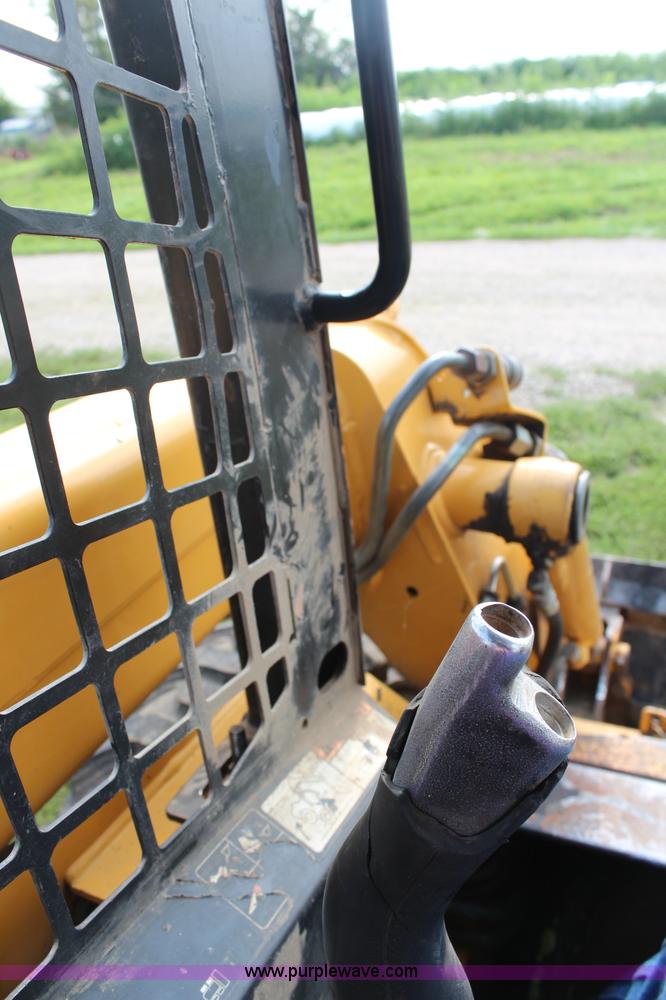 image for item H6519 1999 John Deere 250 skid steer