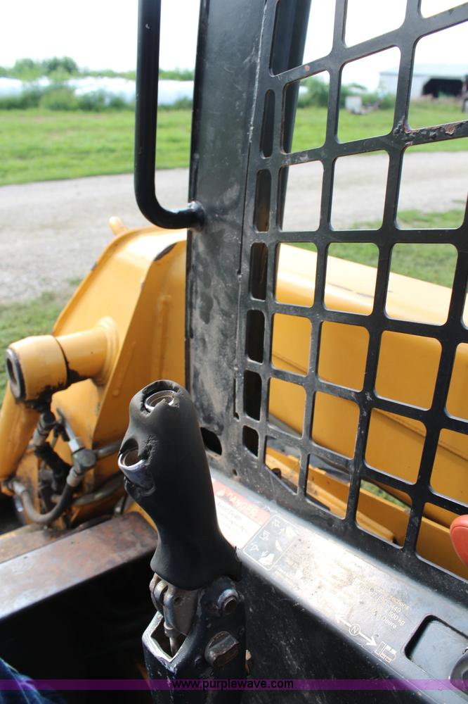 image for item H6519 1999 John Deere 250 skid steer