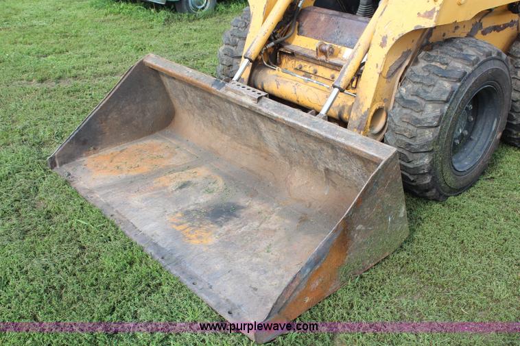 image for item H6519 1999 John Deere 250 skid steer