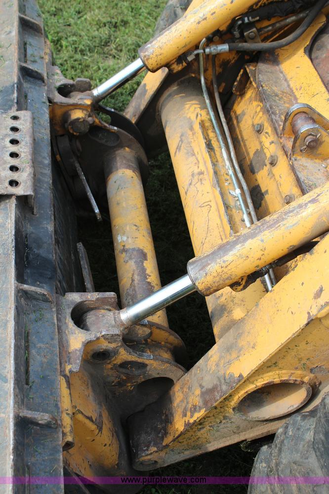 image for item H6519 1999 John Deere 250 skid steer