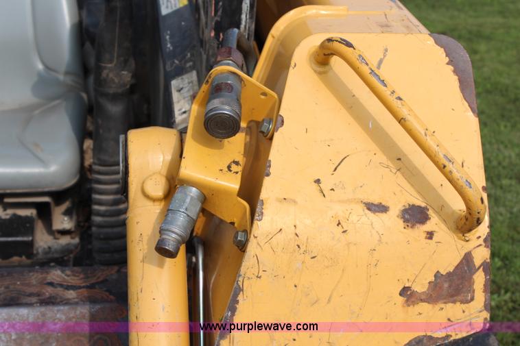 image for item H6519 1999 John Deere 250 skid steer